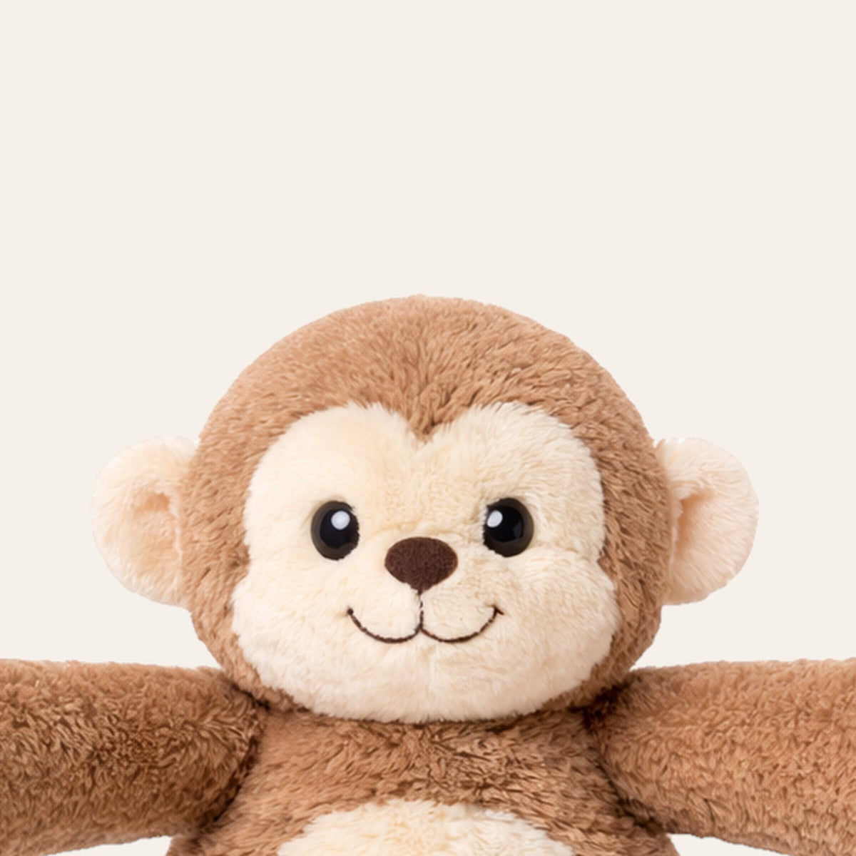 Verzwaarde knuffel aap van dichtbij